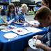 Lydia and Ava Hall and Aidan Lafferty create crafts during the Mayor's Green Fair on Friday, June 14. Daniel Brenner I AnnArbor.com